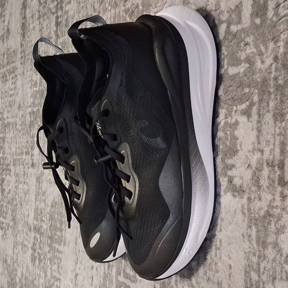 Black Athletic Running Shoes with White Midsole